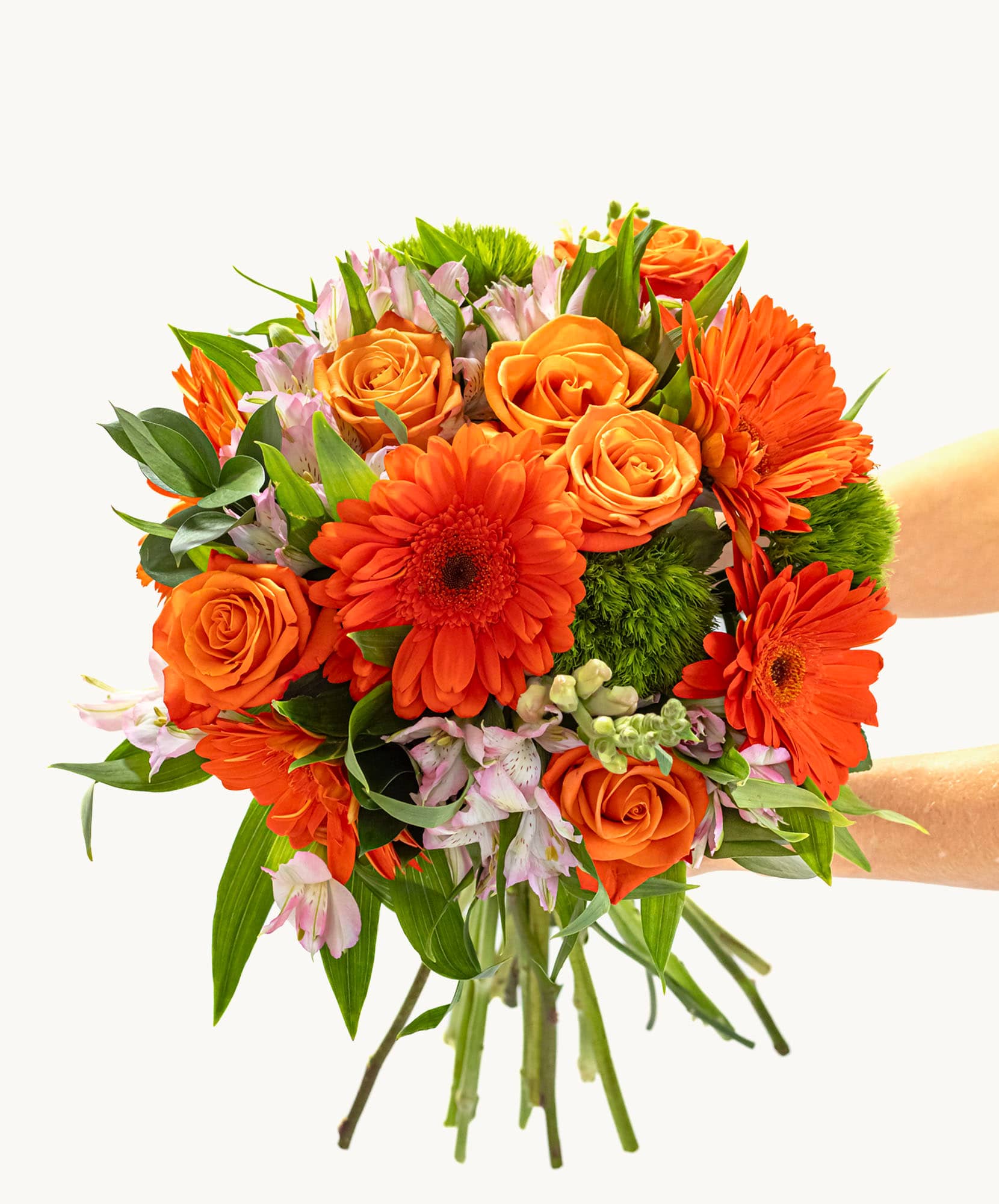 Vibrant bouquet featuring orange roses and gerbera daisies, perfect for celebrations.